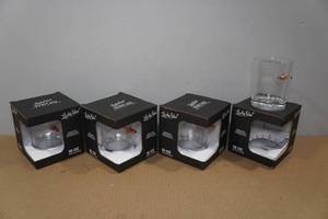 lot 151 image: 4 Lucky Shot Whiskey Glasses with Embedded Bullets