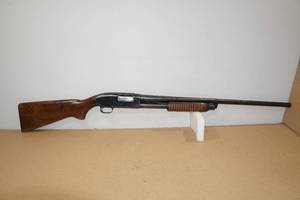 lot 21 image: 1952 Winchester Model 25 12 Gauge Pump-Action Shotgun
