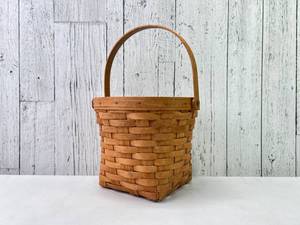 lot 90 image: Longaberger Woven Basket with Handle
