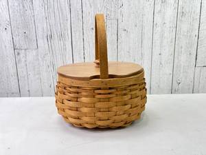 lot 99 image: Longaberger Handmade Basket with Lid and Accessories