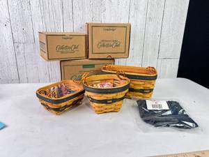 lot 9 image: 3 Longaberger Baskets with Liners and Boxes