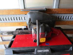 lot 10 image: Poulin Chain Saw