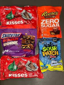 lot 21 image: Assorted Candy Pack Hersheys Kisses, Reeses, Snickers, Sour Patch Kids