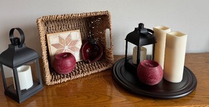 lot 24 image: Assorted Home Decor Set with Basket, Lanterns, and Battery-Operated Candles
