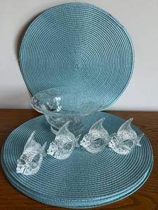 lot 47 image: Set of 6 Blue Placemats, Glass Bowl, and 4 Fish Shaped Napkin Rings