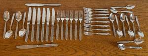 lot 50 image: Oneida 34-Piece Stainless Steel Flatware Set