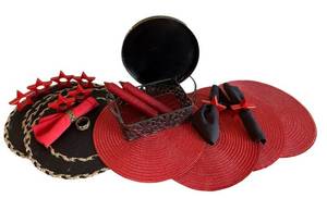 lot 53 image: Decorative Table Set with Napkins, Star Napkin Rings, Placemats, and Metal Basket