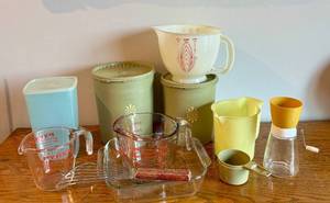 lot 57 image: Vintage Kitchen Collection with Measuring Cups and Tupperware