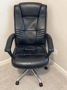lot 59 image: Used Black Faux Leather Office Chair with Adjustable Height