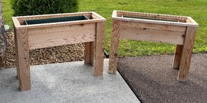 lot 104 image: Two Pretty Wooden Planter Boxes