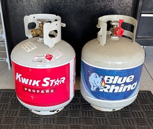 lot 114 image: Kwik Star and Blue Rhino Propane Tanks