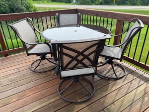 lot 17 image: Outdoor Patio Set with Glass Top Table and 4 Swivel Chairs