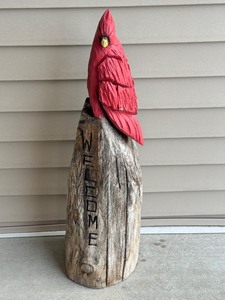 lot 91 image: Wood Carved Welcome Statue with Red Cardinal Design