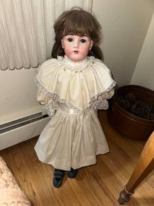 lot 36 image: Antique Porcelain Doll in Cream Dress with Lace Detailing - 26 Inches