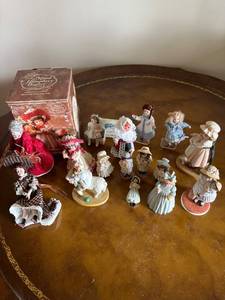 lot 46 image: Collection of 14 Maud Humphrey Bogart Figurines