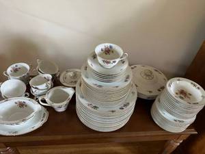 lot 56 image: Extensive Noritake Bone China Dinnerware Set with Floral Motif service for 12