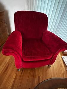 lot 78 image: Plush Red Armchair with Cushioned Seat