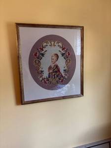 lot 120 image: Framed Needlepoint Artwork of a Child with Floral Motif