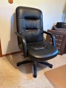 lot 125 image: Used Black Leather Office Chair with Minor Wear