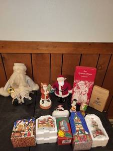 lot 250 image: Assorted Santa Claus Figurines and Christmas Decor Collection