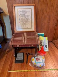 lot 358 image: Assorted Household Items Including Footstool, Kindle, and Framed Art