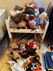 lot 380 image: Large Collection of Vintage and Modern Teddy Bears and Dolls with Wooden Display Bed