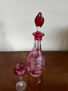 lot 407 image: Vintage Red and Clear Cut Glass Decanter with Stopper and Glass