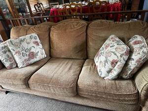 lot 434 image: Used Brown Three-Seater Sofa with Floral Cushions