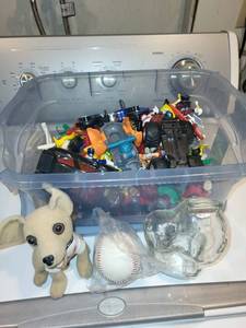 lot 532 image: Assorted Lot of Toys, Taco Bell Dog Plush, Saints Baseball, and Glass Dog Figure