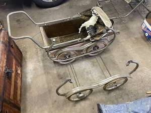 lot 613 image: Vintage Royal Crest Baby Pram with Toy Horse