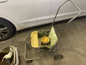 lot 615 image: Vintage Metal Shopping Cart with Seat and Storage