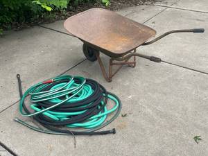lot 656 image: Used Metal Wheelbarrow and Garden Hose Set