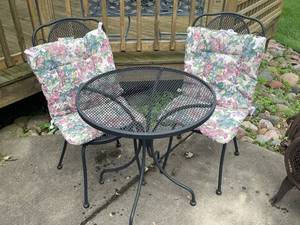 lot 676 image: Black Metal Bistro Set with Floral Cushions