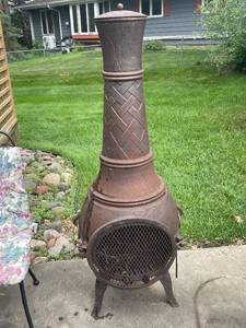 lot 677 image: Vintage Cast Iron Outdoor Chiminea with Lattice Design