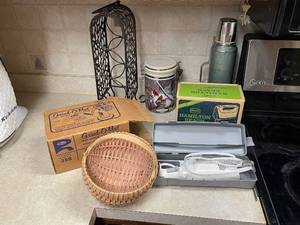 lot 709 image: Vintage Kitchen Appliance Lot with Grinder, Mixer, and Thermos