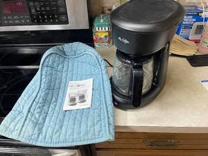 lot 712 image: Used Mr. Coffee 12-Cup Coffeemaker with Cover and Manual