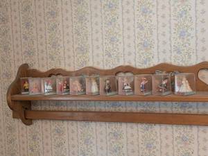 lot 306 image: 1997 Hallmark Keepsake Madame Alexander Collection and Wood Shelf - Set of Miniature Figurines
