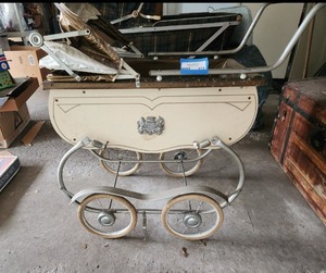 lot 613 image: Vintage Royal Crest Baby Pram with Toy Horse