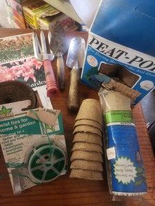 lot 736 image: Gardening Tool Set with Peat Pots and Twist Ties