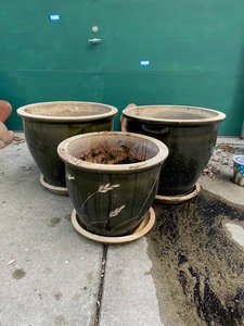 lot 663 image: Collection of 3 Large Garden Planters with Assorted Garden Decor