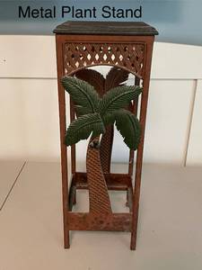 lot 82 image: Vintage Metal Plant Stand with Palm Tree Design