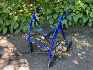 lot 116 image: Foldable Blue Rollator Walker with Seat and Hand Brakes