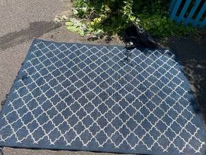 lot 128 image: Blue Outdoor Rug with Geometric Pattern