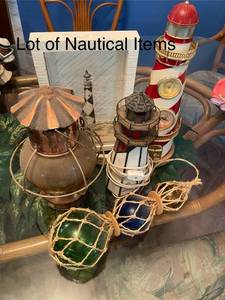 lot 250 image: Lot of Nautical Items with Lighthouse Decor and Lanterns