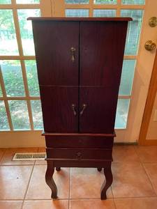 lot 270 image: Elegant Wooden Jewelry Armoire with Mirror and Ample Storage