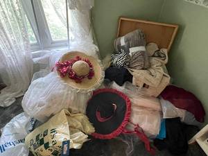 lot 406 image: Assorted Clothing and Hats Collection
