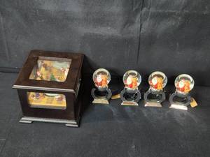 lot 38 image: Christmas Musical Box and Set of Santa Snow Globe Napkin Rings