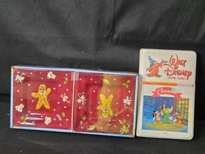 lot 40 image: Walt Disney A Walt Disney Christmas VHS and Laurie Gates Holiday Treats Appetizer Plates