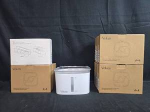 lot 104 image: Veken Pet Water Fountain with Replacement Filters and Accessories