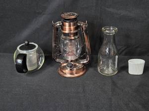 lot 107 image: Collection of Vintage Household Items with Lantern, Teapot, and Glass Milk Bottle